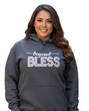 Woman wearing a gray hoodie with 'beyond BLESS' text on a white background