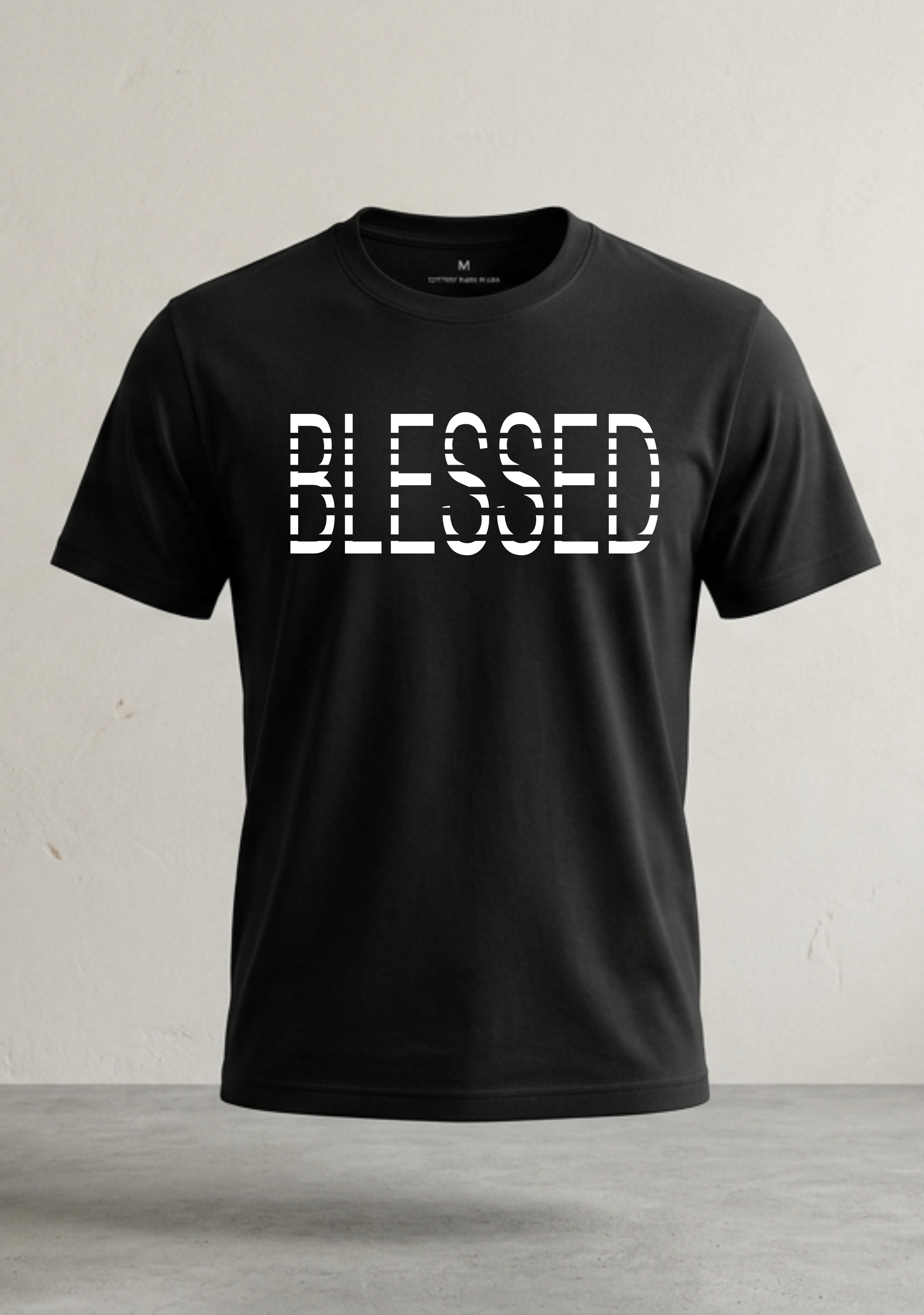 Black t-shirt with 'BLESSED' text on a light gray background