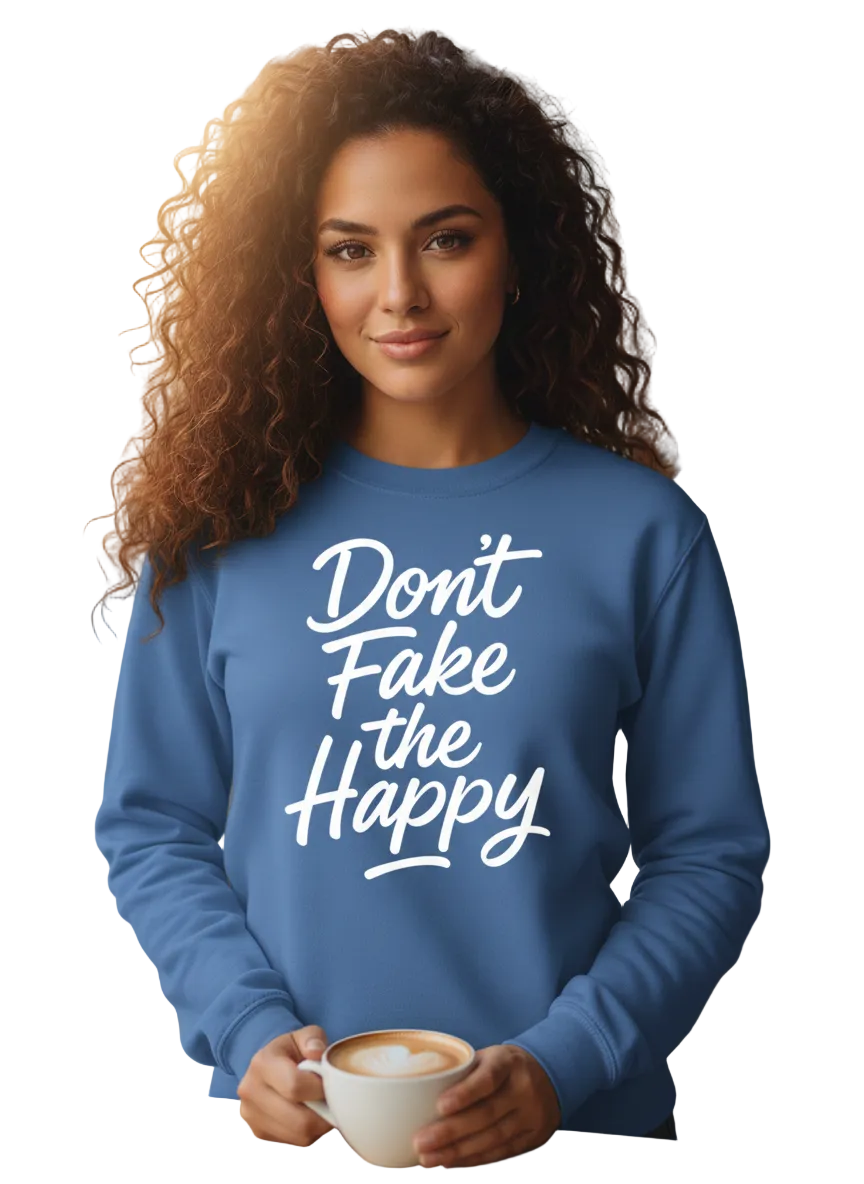 Woman wearing a blue sweatshirt with 'Don't Fake the Happy' text, holding a coffee cup.