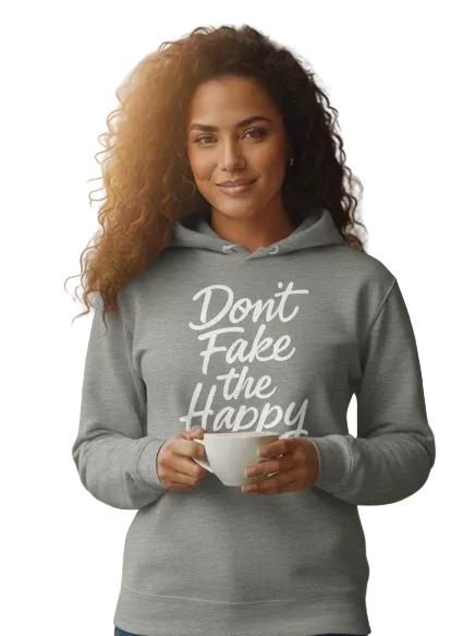 Woman wearing a gray hoodie with text in a cafe setting