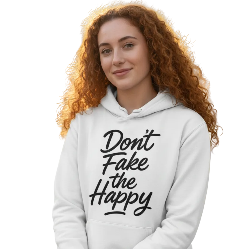 Person wearing a white hoodie with 'Don't Fake the Happy' text in a park setting